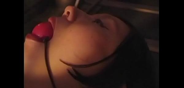  BDSM bitch drips hot wax on petite bondaged asian with red ball in mouth